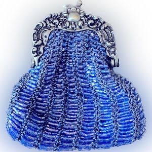 Beaded coin purse with metal clasp iridescent cornflower blue bugle beads.